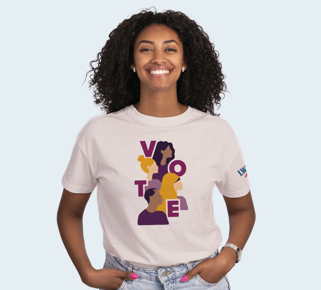 A woman in the winning "VOTE" t-shirt design picked by LWV supporters