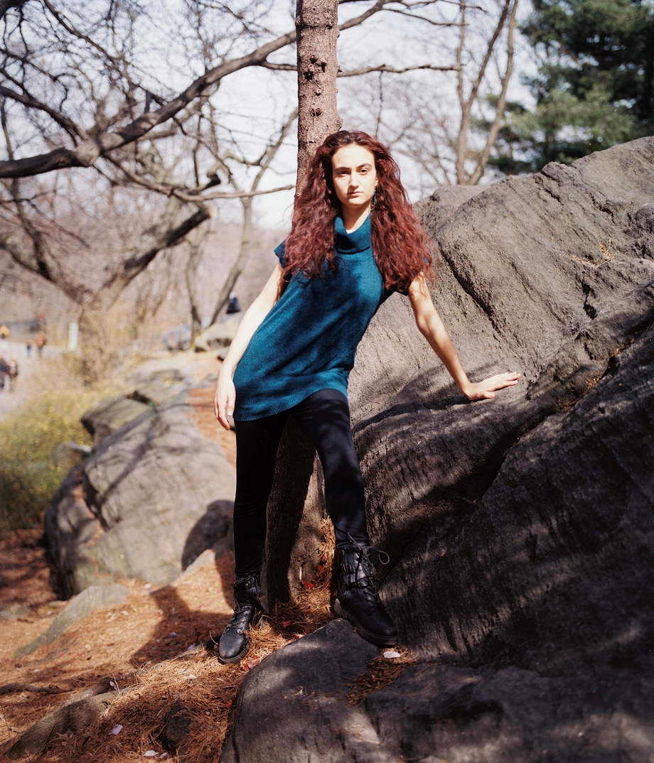 Jamie Margolin standing in a forest