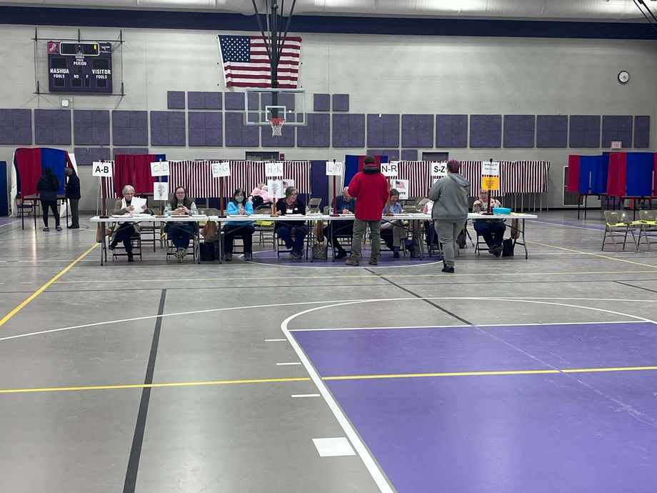 Voting station and election workers at the New Hampshire primaries