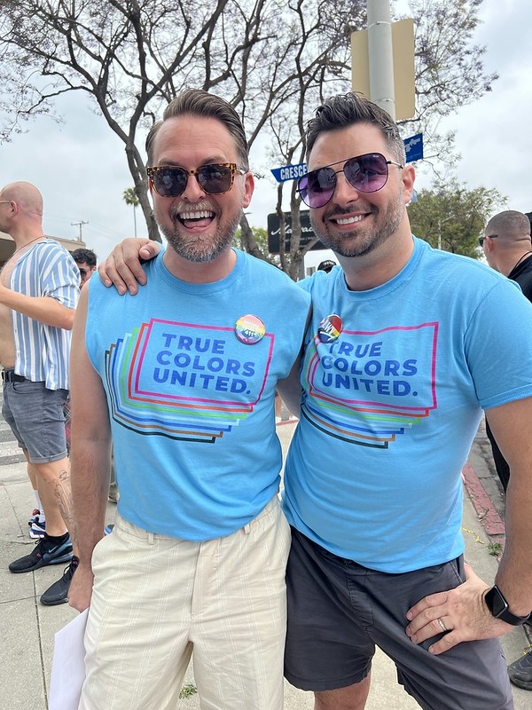 Two men in True Colors United shirts