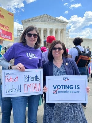 League members in front of the Supreme Court protesting for abortion rights