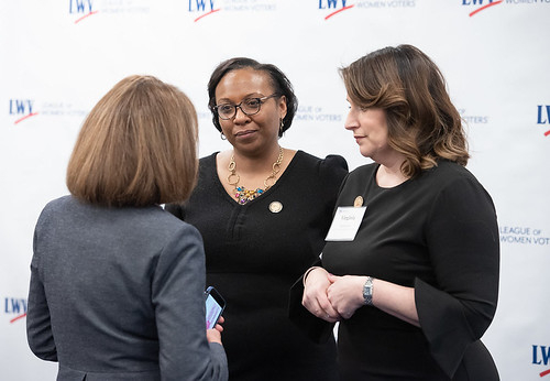 Celina Stewart and Virginia Kase Solomon with a woman in Congress