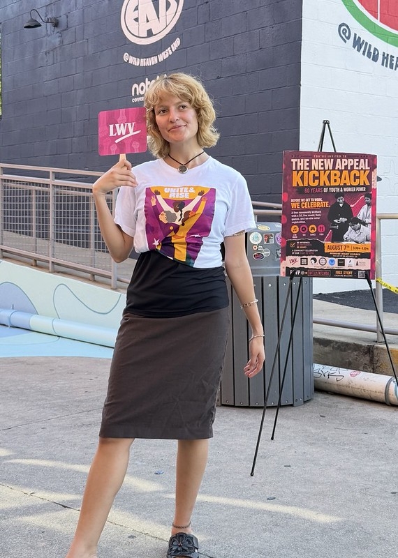 A person in a Unite and Rise shirt at the day of action in Atlanta, Georgia