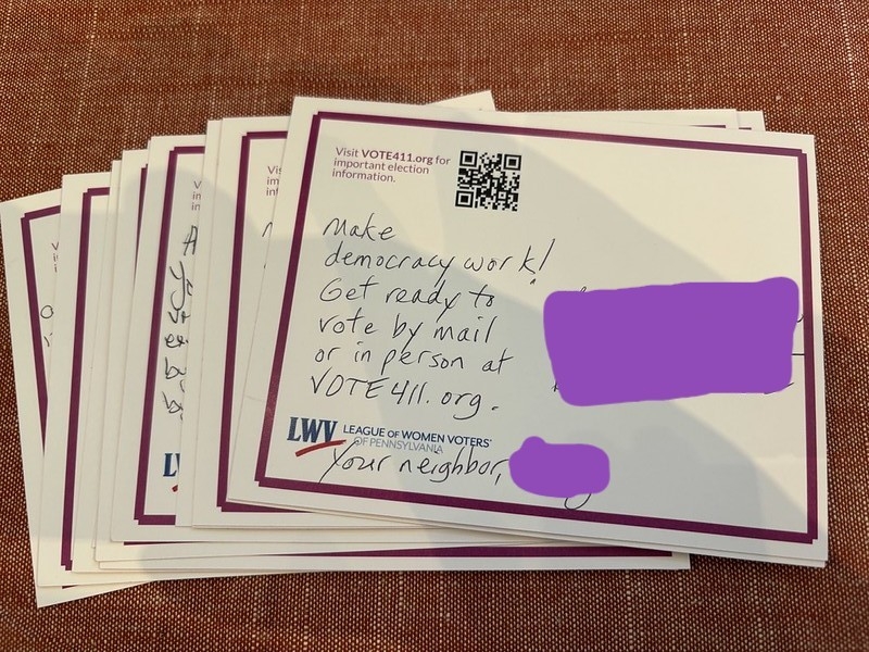A postcard to a potential voter with the personal info crossed out