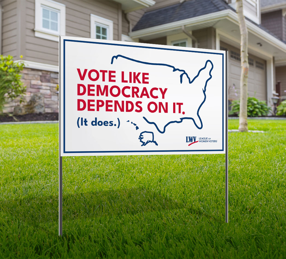 A yard sign that says 