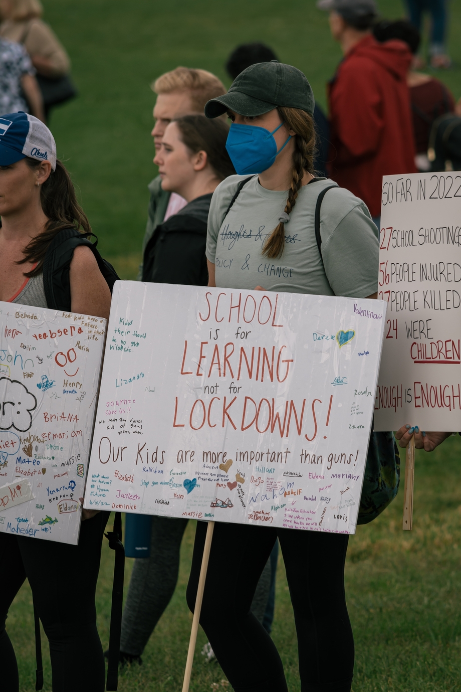 Gun control protestor holding a sign that says 