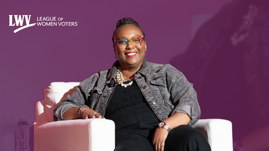 Celina Stewart sitting and smiling on a purple background with the LWV logo in the upper lefthand corner